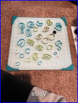 Clay earring set, used, includes cutters, clay, tools